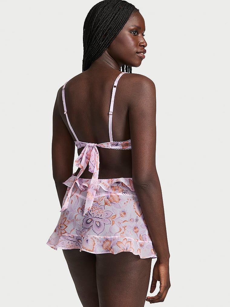 Zástěra a tanga Vintage Blossom Babydoll. Produkt má květinový vzor a pochází z kolekce Very Sexy.