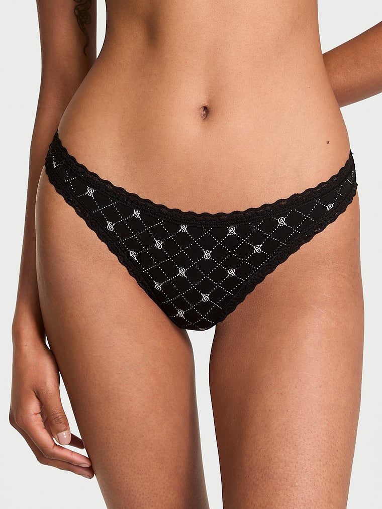 Bavlněná tanga s krajkou na krajkách v pase. Produkt je vzorovaný a pochází z kolekce Lacie.