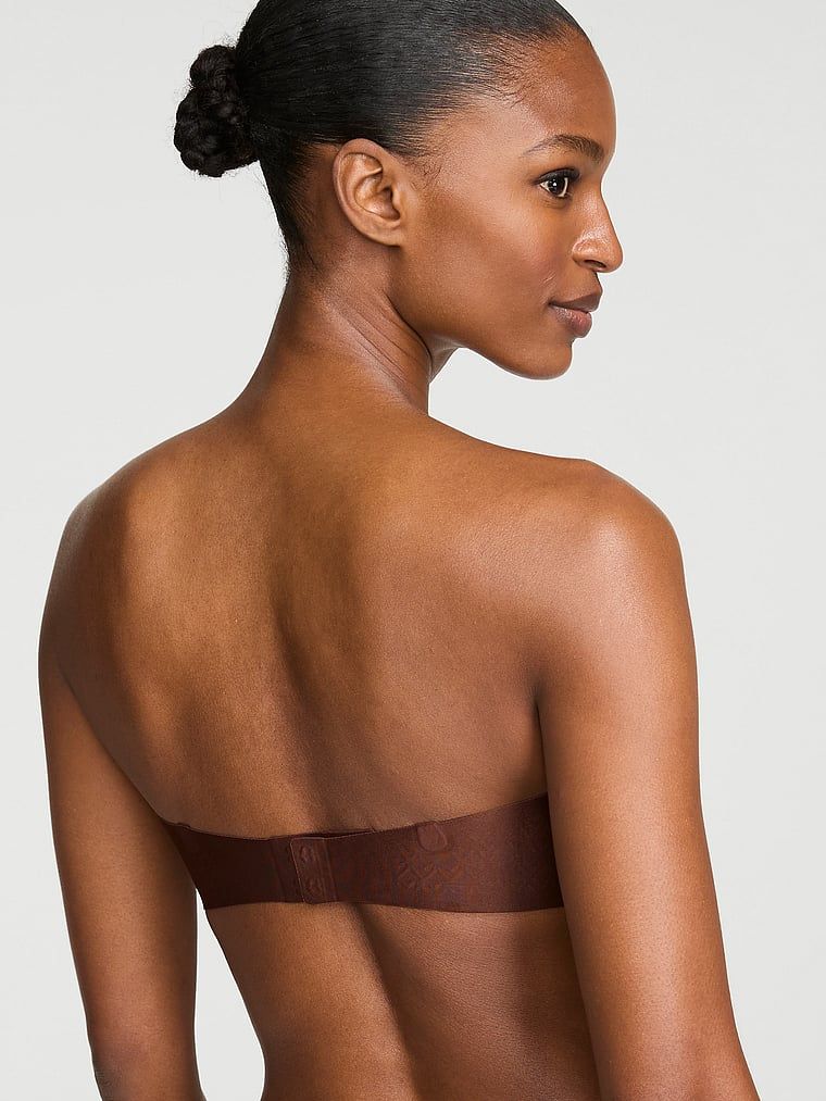 Push-up podprsenka Uplift Strapless je hnědá a je součástí kolekce Invisible by Victoria's Secret.