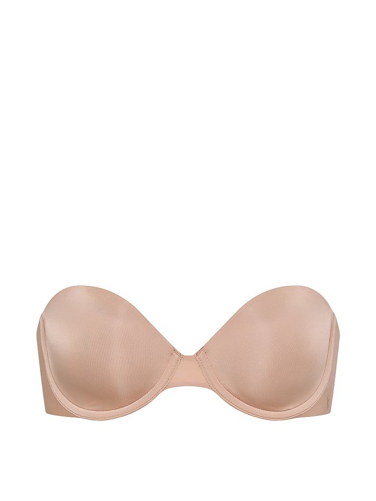 Podprsenka bez ramínek s mírně vypolstrovanými ramínky. Produkt je béžové barvy a pochází z kolekce Invisible by Victoria's Secret.