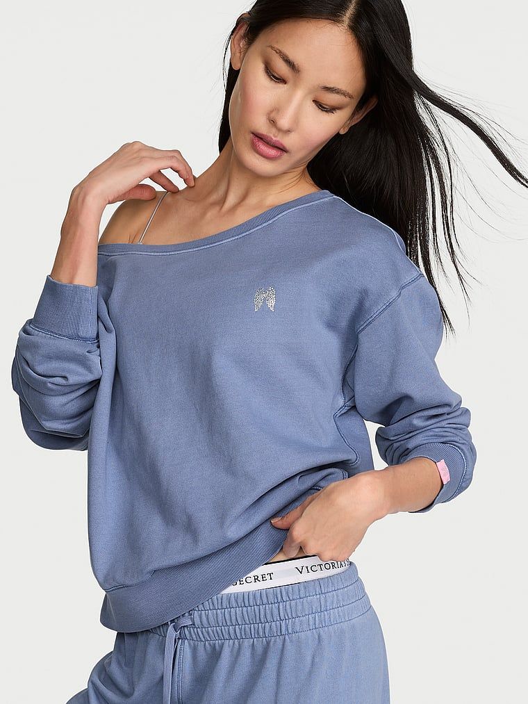 Bavlněná mikina s výstřihem Terry Boatneck. Produkt je modré barvy a pochází z kolekce Angel Essentials.