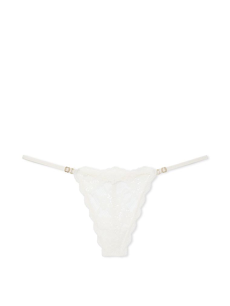 Krajková tanga s nastavitelnými řemínky Lace V-String. Výrobek je bílý a pochází z kolekce Dream Angels.