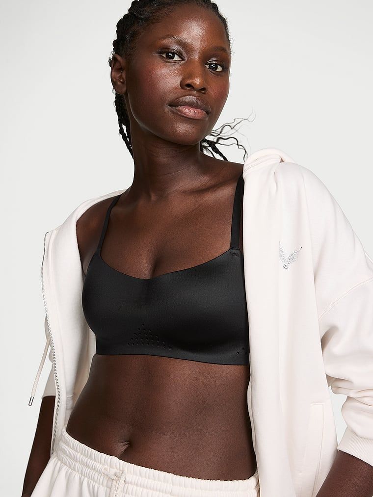 Sportovní podprsenka vyrobená z lesklého materiálu VSX Featherweight Light GlossyTech. Produkt je černý a pochází z kolekce VSX.