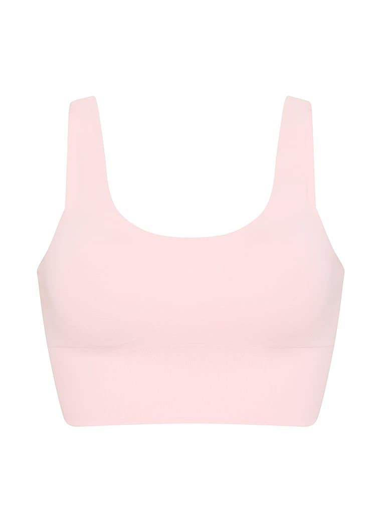 VSX Elevate sportovní podprsenka s hladkým povrchem. Produkt je růžové barvy a pochází z kolekce VSX.
