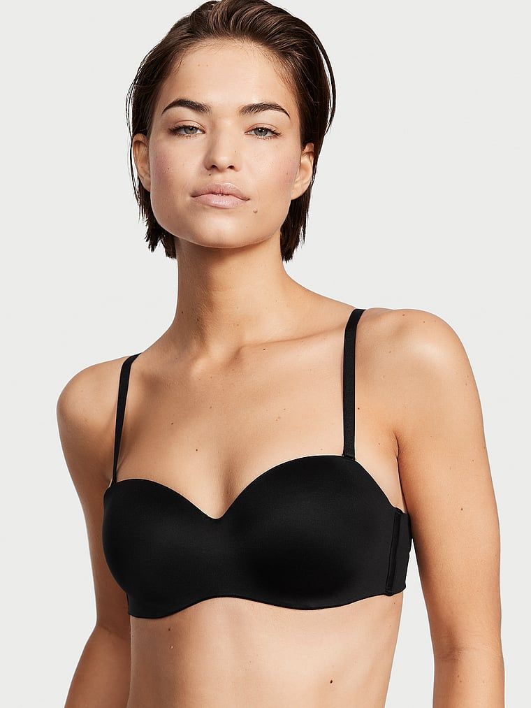 Mírně vyztužená podprsenka bez ramínek. Produkt je černý a pochází z kolekce Body by Victoria.