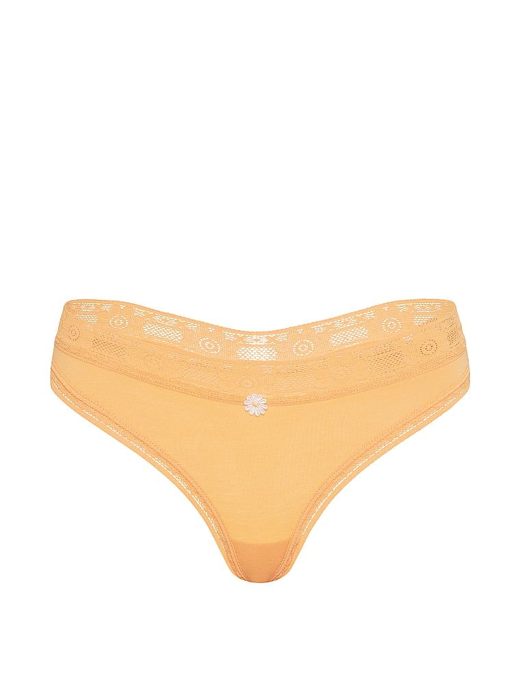 Bavlněné tanga s krajkovým lemem Lace-Lem. Produkt je žluté barvy a pochází z kolekce Lace Trim.