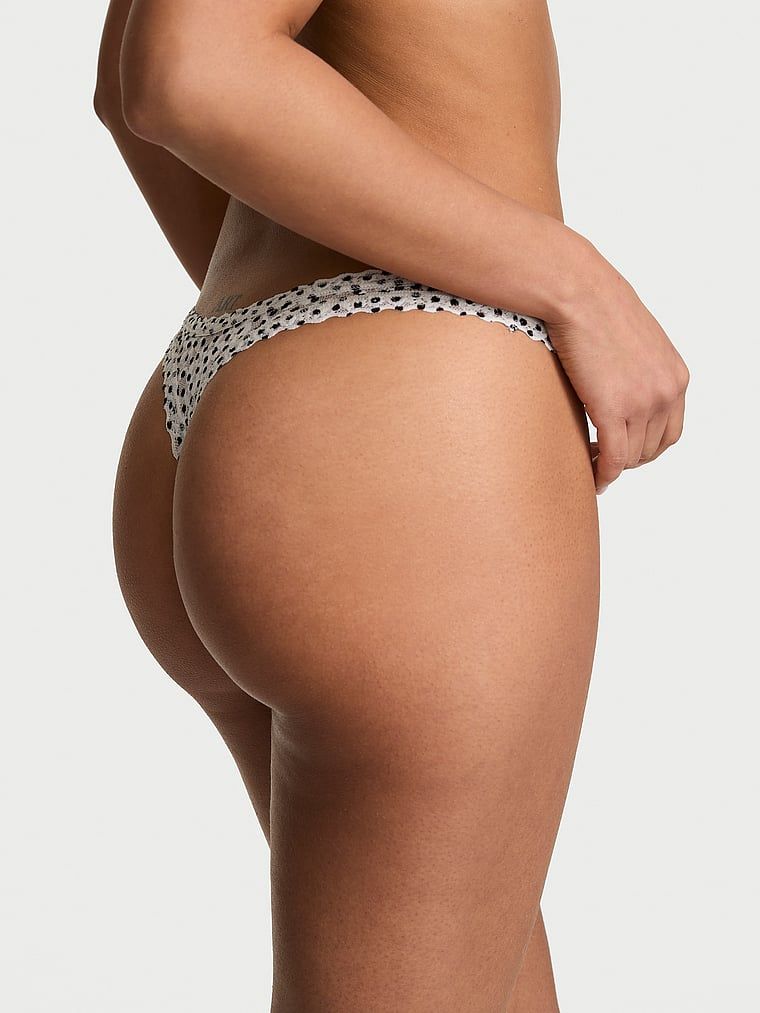 Ultra-Mini Scoop krajkové tanga. Produkt je vzorovaný a pochází z kolekce Lacie.