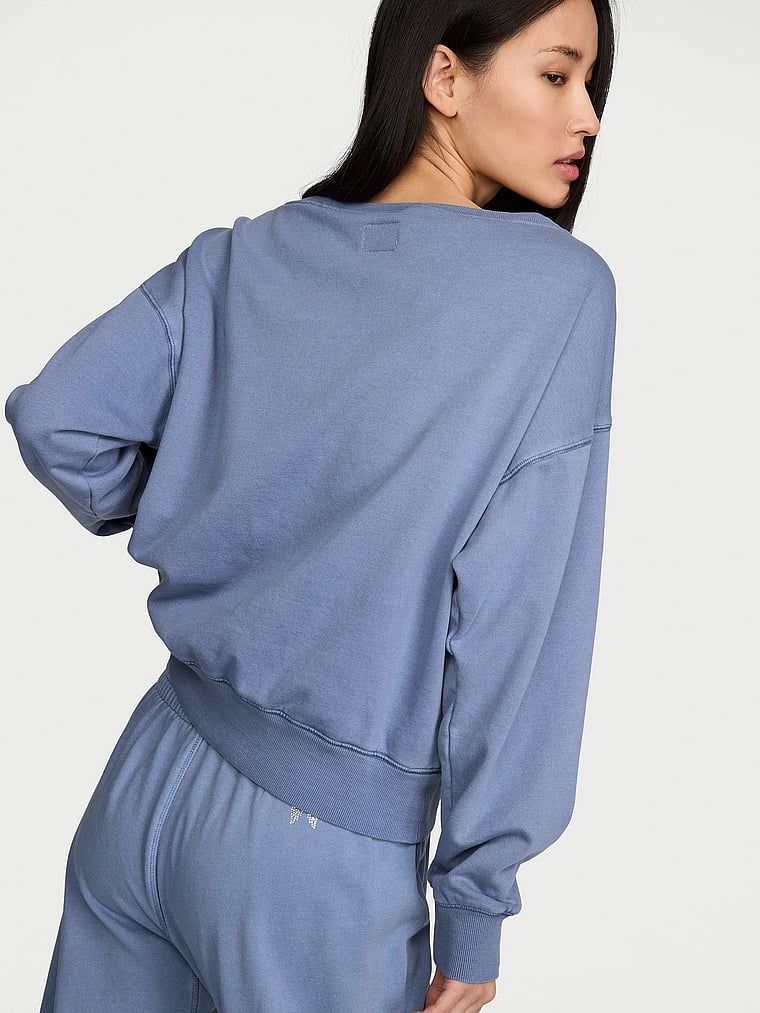 Bavlněná mikina s výstřihem Terry Boatneck. Produkt je modré barvy a pochází z kolekce Angel Essentials.