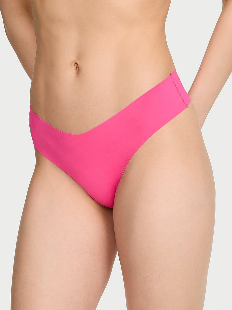 Bezšvové tanga s ramínky na zadní straně No-Show Strappy. Produkt je růžové barvy a pochází z kolekce No-Show.
