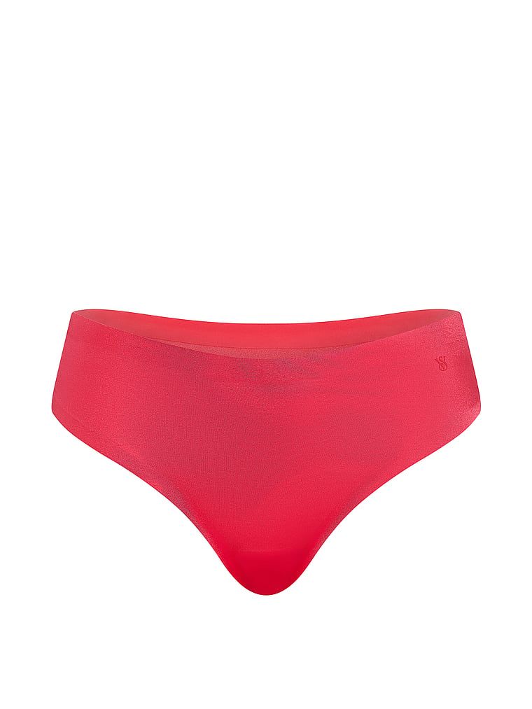 Tanga s pasem středně neviditelným. Produkt je červené barvy a pochází z kolekce No-Show.