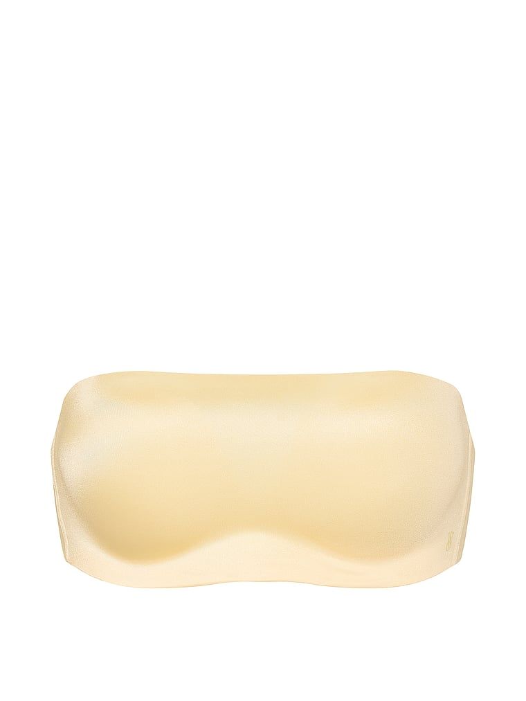 Bandeau podprsenka bez ramínek a s kosticí s klikami. Produkt je žluté barvy a pochází z kolekce Invisible by Victoria's Secret.