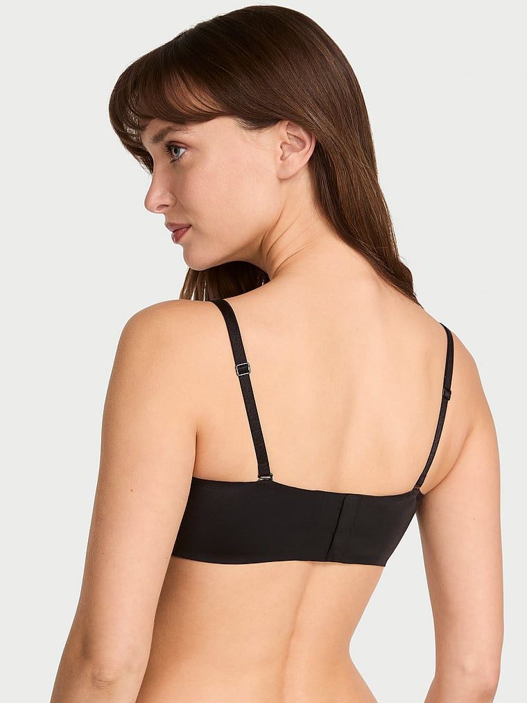 Push-up podprsenka bez ramínek a s kosticemi Perfect Comfort Strapless. Produkt je černý a pochází z kolekce Victoria's Secret Bare.
