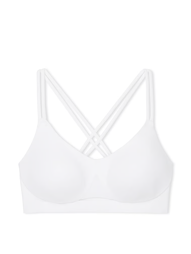 Sportovní podprsenka s lehkou podporou Elevate Strappy. Produkt je bílý a pochází z kolekce VSX.