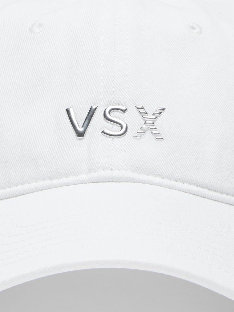 Kšiltovka VSX. Produkt je bílý a pochází z kolekce Victoria's Secret.