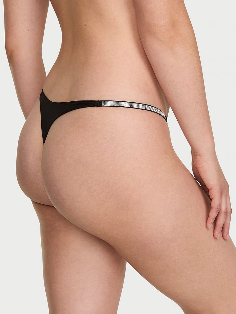 Tangový lesk mašle. Produkt je černý a pochází z kolekce Very Sexy.