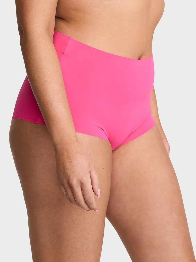 Bezešvé kalhotky s ramínky na zádech No-Show Strappy. Produkt je růžové barvy a pochází z kolekce No-Show.