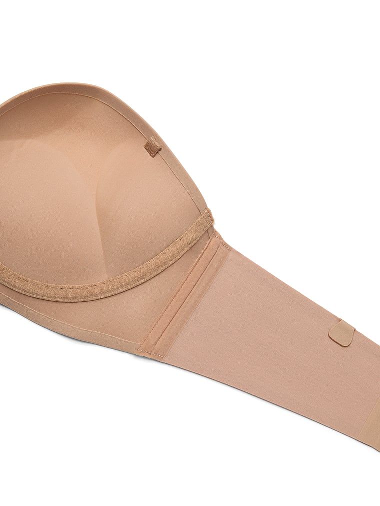 Push-up podprsenka bez ramínek 2 velikosti Bombshell. Produkt je béžové barvy a pochází z kolekce Invisible by Victoria's Secret.