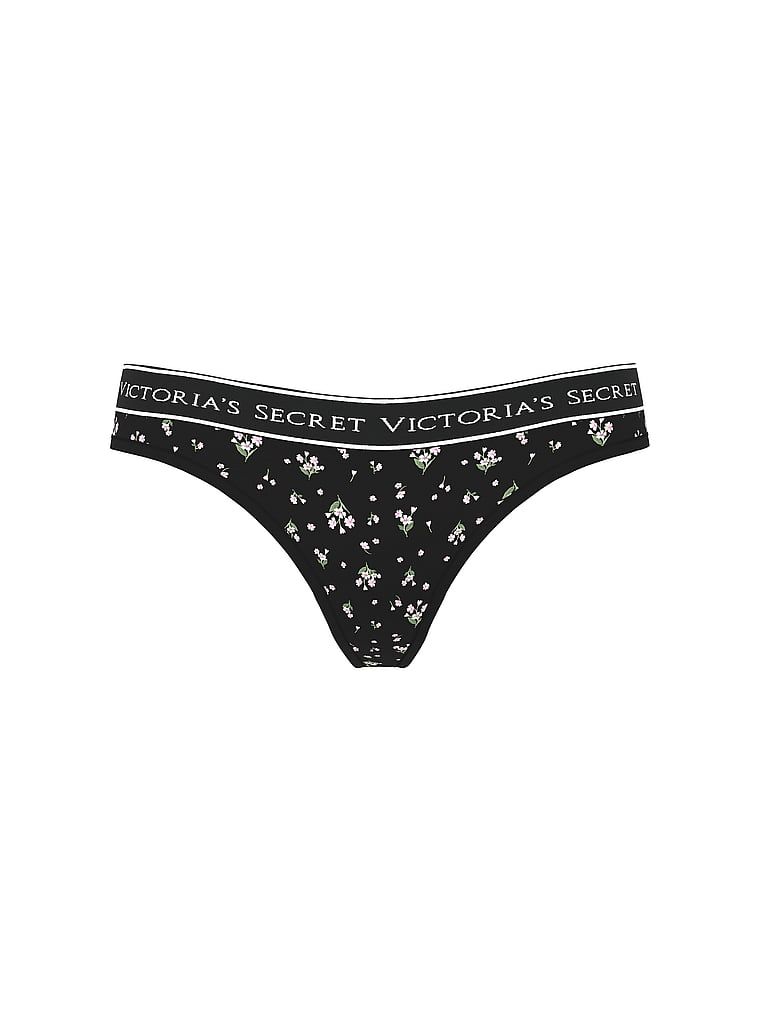 Bavlněné tanga s logem v pase. Produkt má květinový vzor a pochází z kolekce Cotton.
