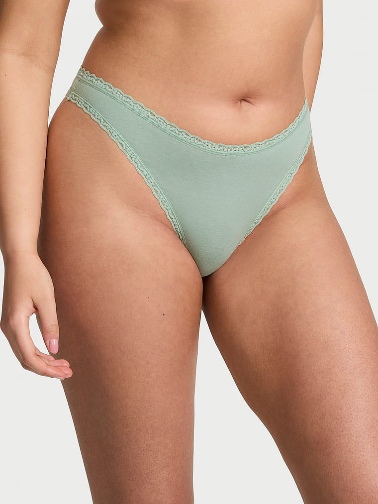 Bavlněná tanga s krajkou na krajkách v pase. Produkt je zelený a pochází z kolekce Lacie.