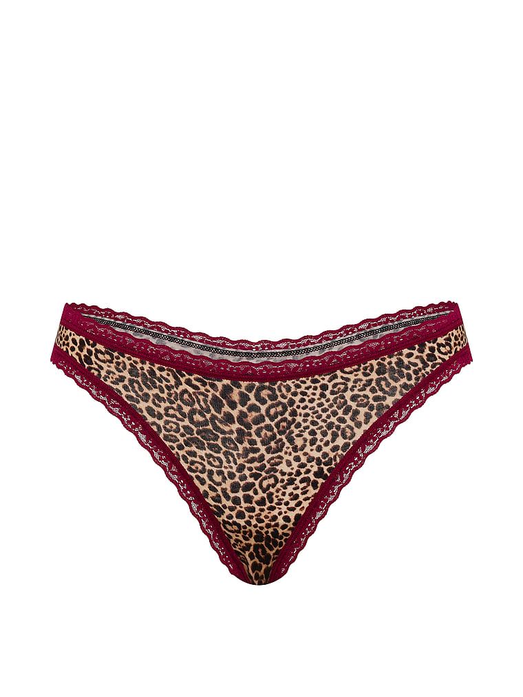 Bavlněné tanga s krajkou na okrajích Lace-Waist. Produkt má vzorovanou barvu a pochází z kolekce Lace Trim.