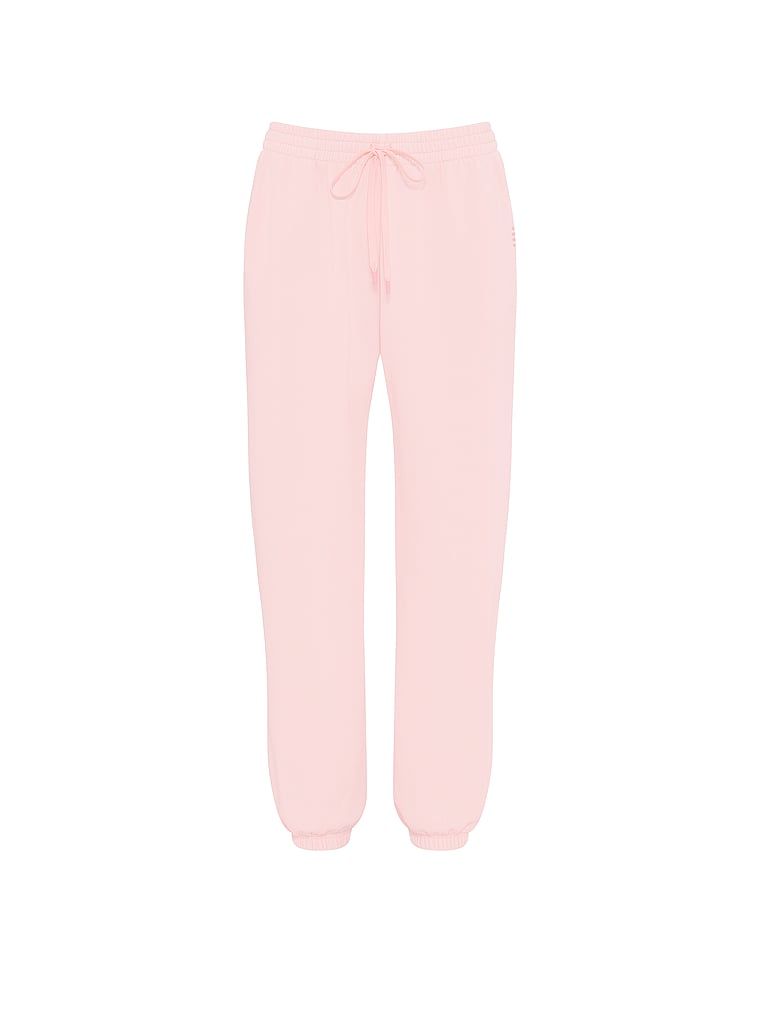 Bavlněné tepláky mimo službu. Produkt je růžové barvy a pochází z kolekce Angel Essentials.
