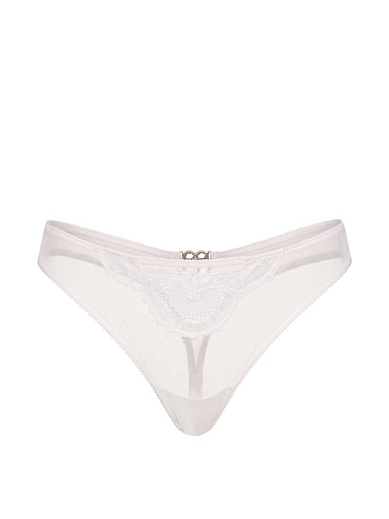 Tanga s třpytivým mašlí. Produkt je bílý a pochází z kolekce Dream Angels.