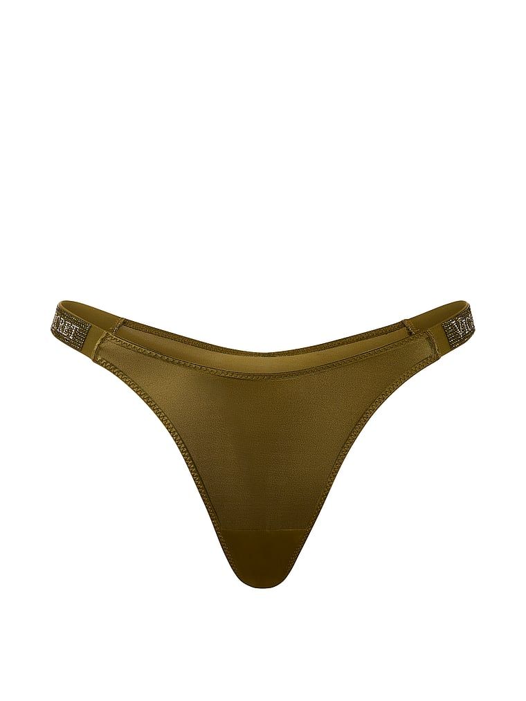 Tanga s lesklými ramínky Shine Strap. Produkt je zelené barvy a pochází z kolekce Very Sexy.