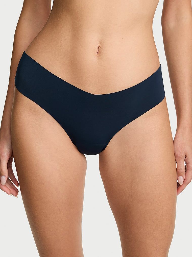 Bezšvové tanga s ramínky na zadní straně No-Show Strappy. Produkt je modré barvy a pochází z kolekce No-Show.