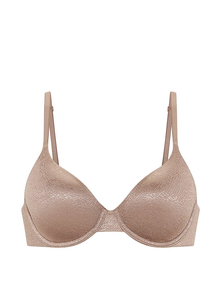 Mírně vycpaná podprsenka s pevně vystavěnými košíčky. Produkt je hnědé barvy a pochází z kolekce Body by Victoria.