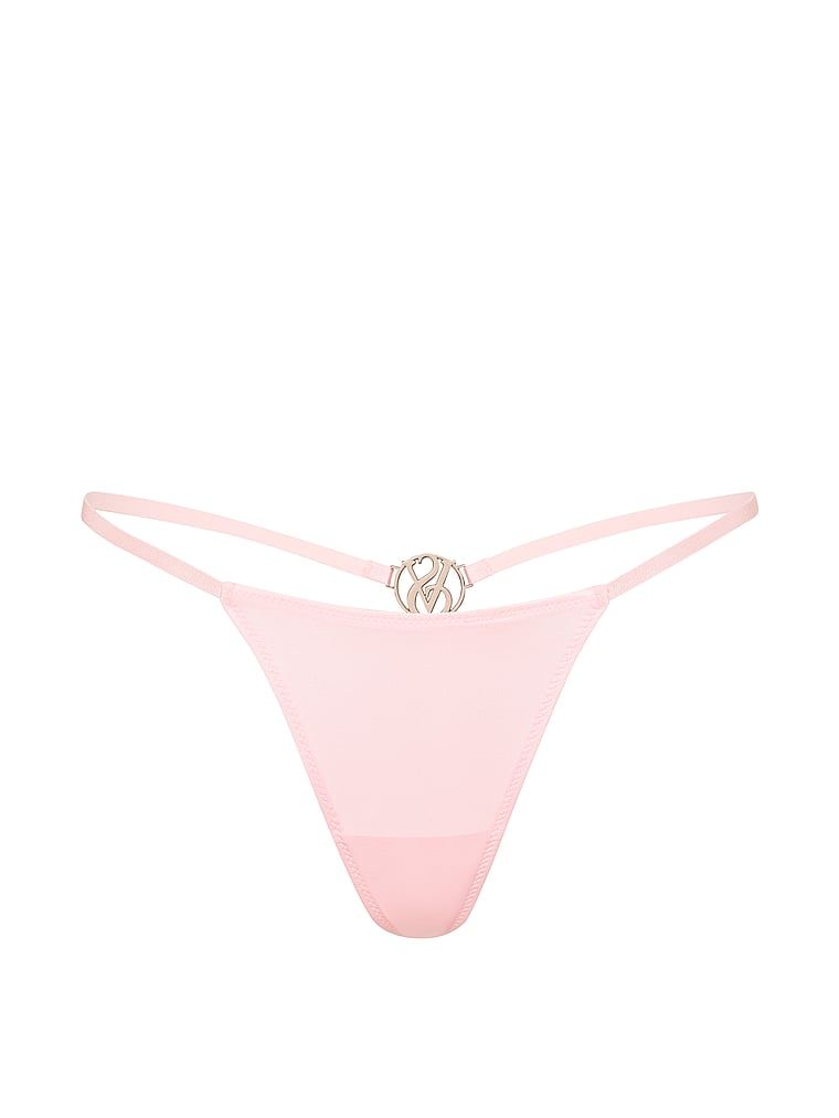 Tanga s lesklým monogramem na zádech. Produkt je růžové barvy a pochází z kolekce Very Sexy.