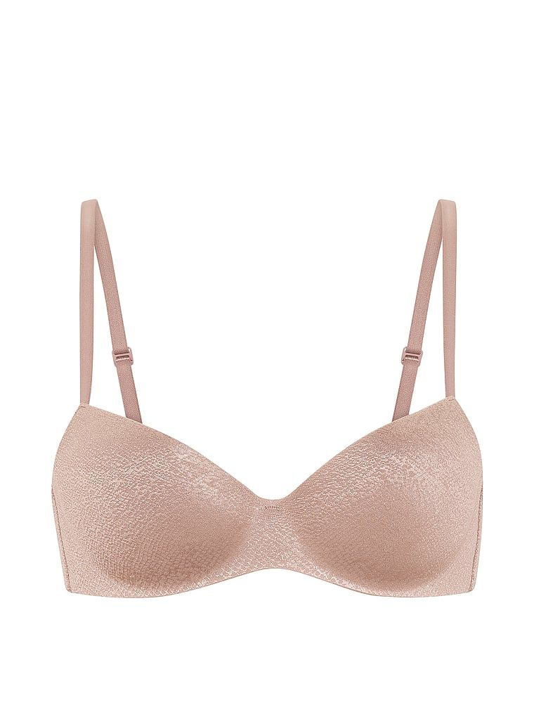 Podprsenka je mírně vycpaná balconetou FlexFactor. Produkt je hnědé barvy a pochází z kolekce Body by Victoria.
