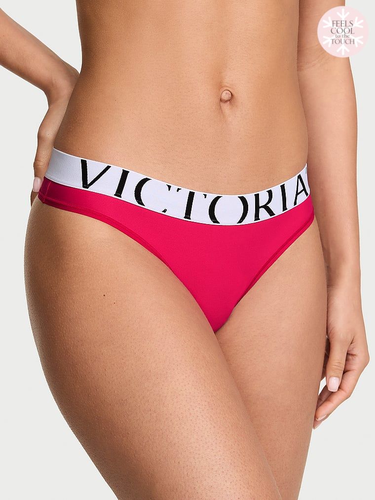 Tanga s logem Cool. Produkt je růžové barvy a pochází z kolekce Victoria's Secret.