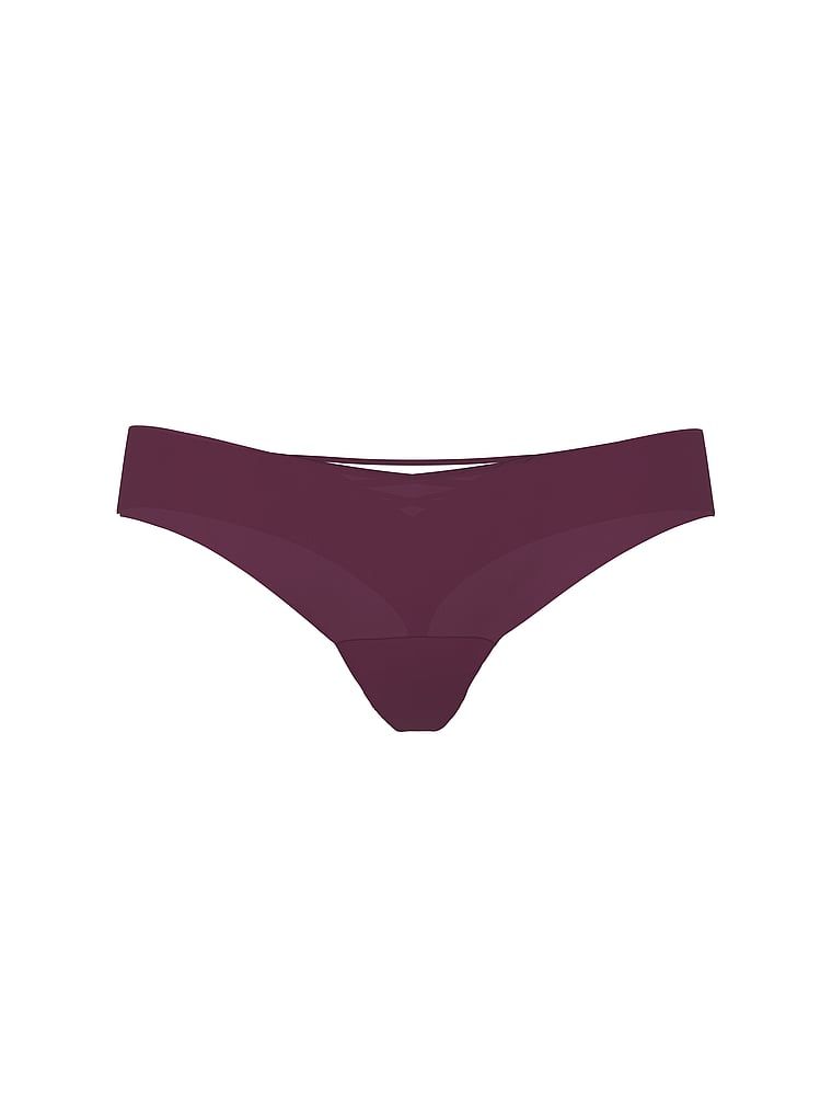 Bezšvové tanga s ramínky na zadní straně No-Show Strappy. Produkt je růžové barvy a pochází z kolekce No-Show.