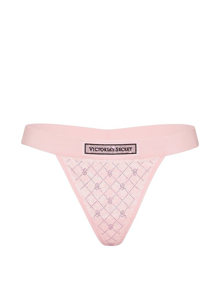 Čipkové tanga Shine Logo. Produkt je růžové barvy a pochází z kolekce Cotton.