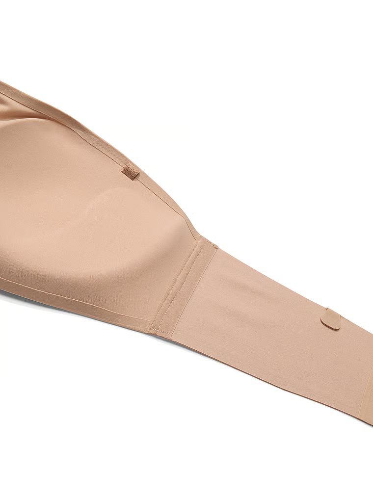 Push-up podprsenka bez ramínek a s kosticemi Perfect Comfort Strapless. Produkt je béžový a pochází z kolekce Victoria's Secret Bare.