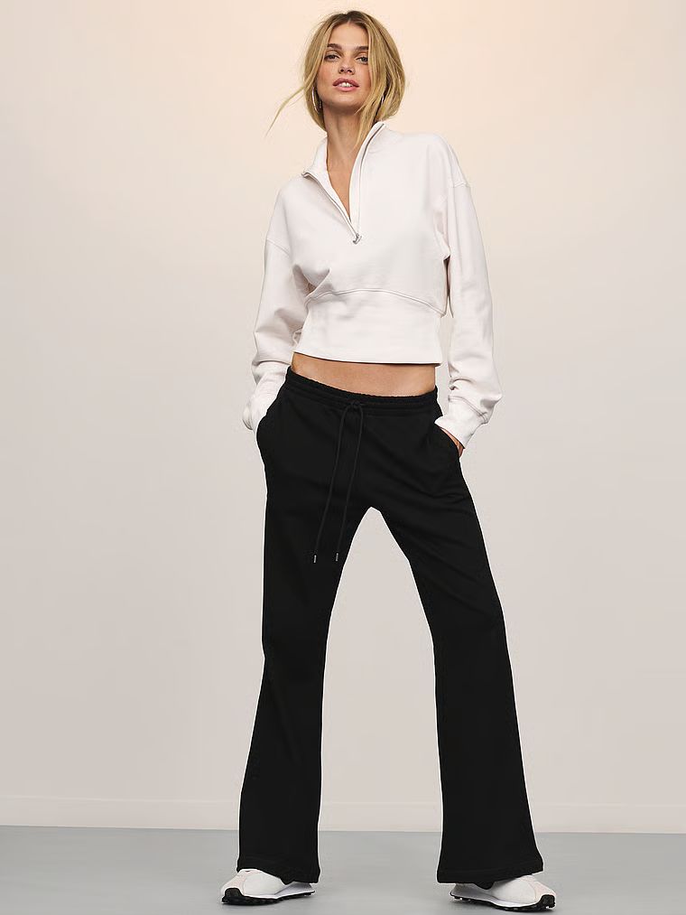 Status Terry krátká mikina na zip. Produkt je bílé barvy a pochází z kolekce Angel Essentials.