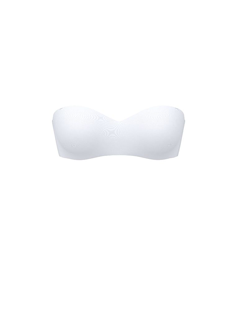Sweetheart podprsenka bez ramínek a mírně vycpávaná podprsenka. Produkt je bílé barvy a pochází z kolekce Invisible by Victoria's Secret.