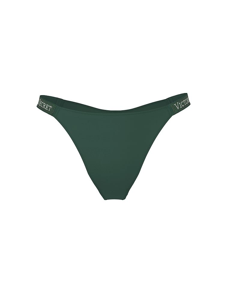 Brazilské kalhotky s brazilskými proužky Shine Strap. Produkt má zelenou barvu a pochází z kolekce Very Sexy.