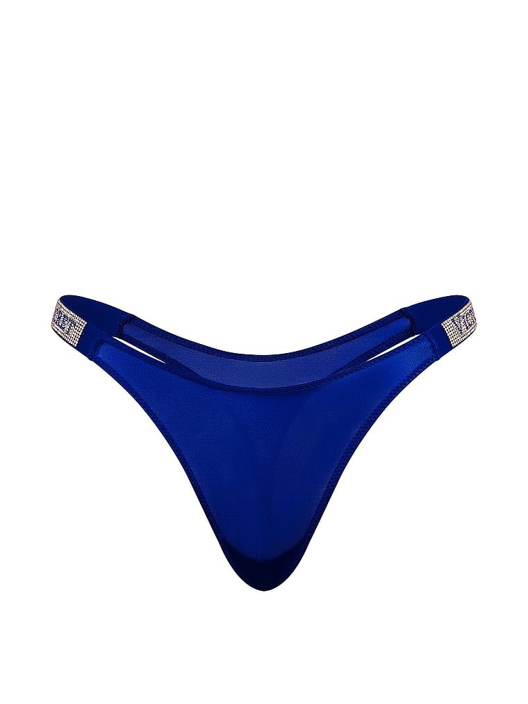 Tanga s lesklými ramínky Shine Strap. Produkt je modré barvy a pochází z kolekce Very Sexy.