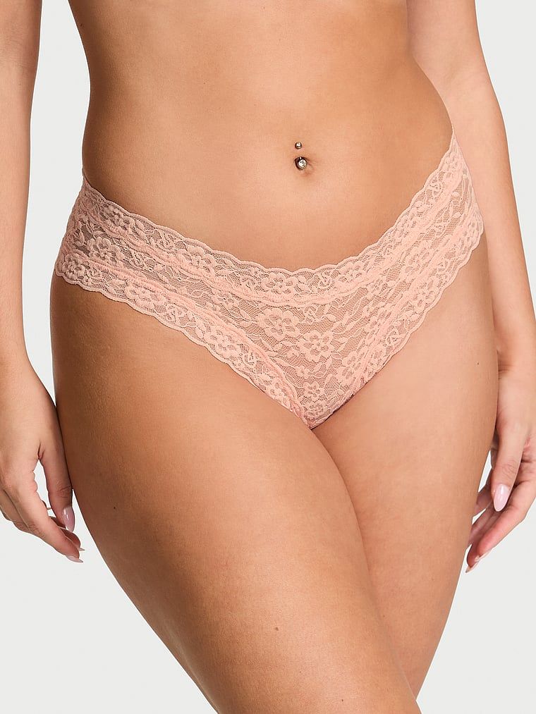 Krajkové kalhotky s ramínky vzadu Blossom Cheeky. Produkt je oranžové barvy a pochází z kolekce Lacie.