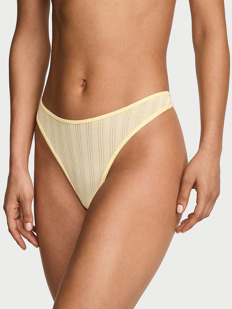 Modální tanga s vysoce střiženými ultra-jemnými nohavičkami. Produkt je žluté barvy a pochází z kolekce Victoria's Secret.
