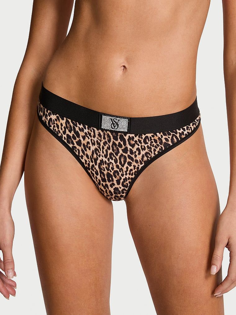 Bavlněná tanga s lesklým logem Shine Patch. Produkt má zvířecí design a pochází z kolekce Cotton.