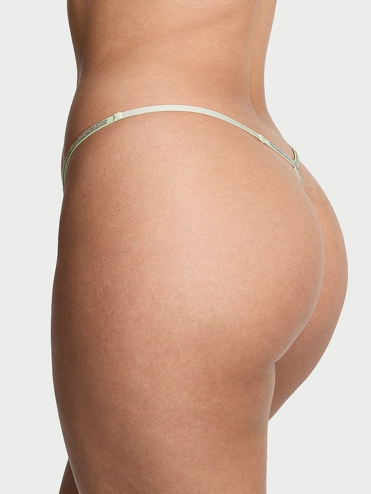 Krajková tanga s lesklými ramínky Twinkle Silver. Produkt je vzorovaný a pochází z kolekce Dream Angels.