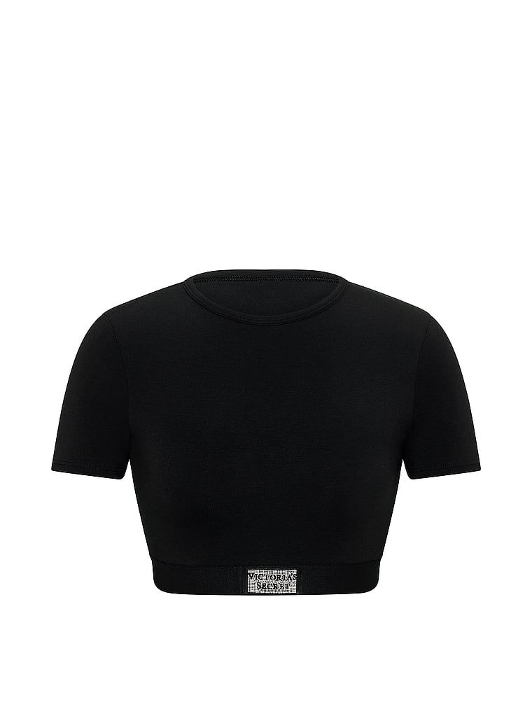 Crop top bavlněná braletka s krátkými rukávy Shine Patch. Produkt je černý a pochází z kolekce triček.
