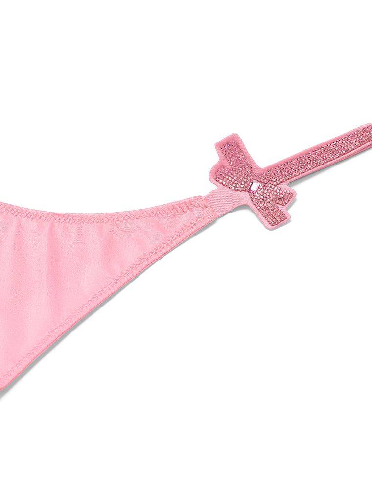 Tangový lesk mašle. Produkt je růžové barvy a pochází z kolekce Very Sexy.
