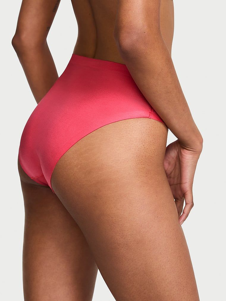 Bikiny kalhotky s neviditelným středním pasem. Produkt je červené barvy a pochází z kolekce No-Show.