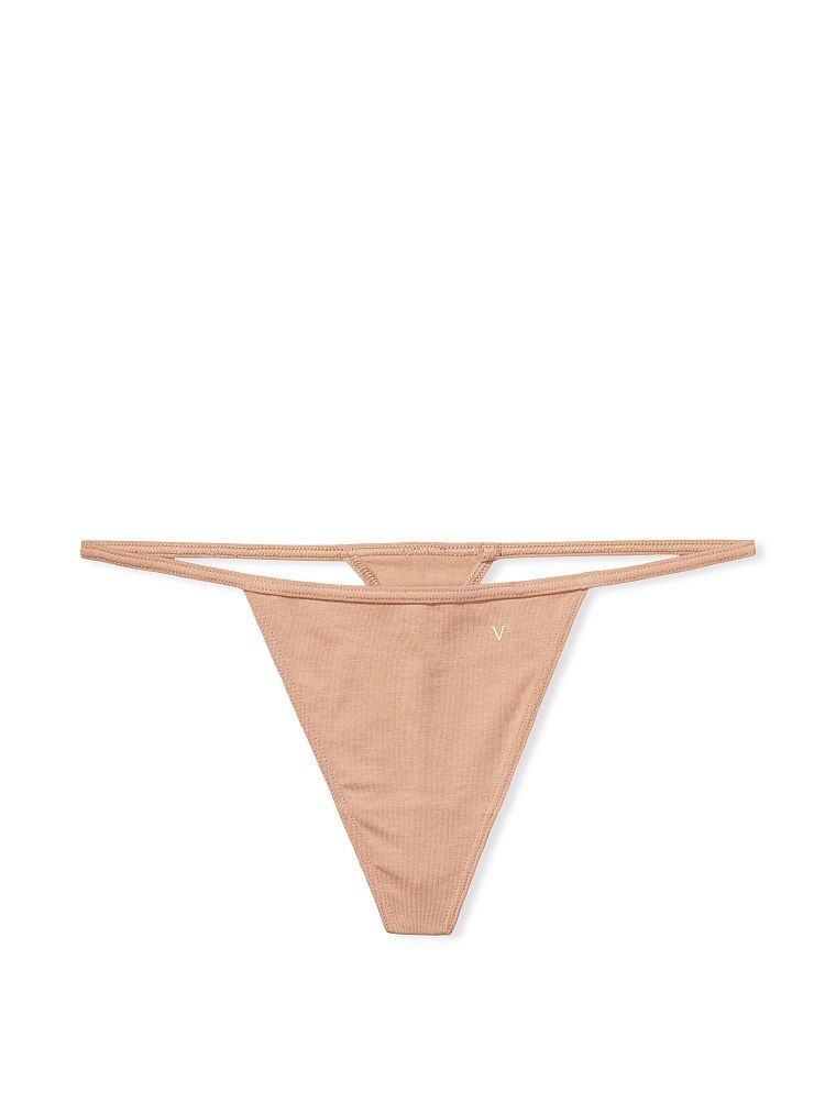 Elastická bavlněná tanga. Produkt je béžový a pochází z kolekce Victoria's Secret.