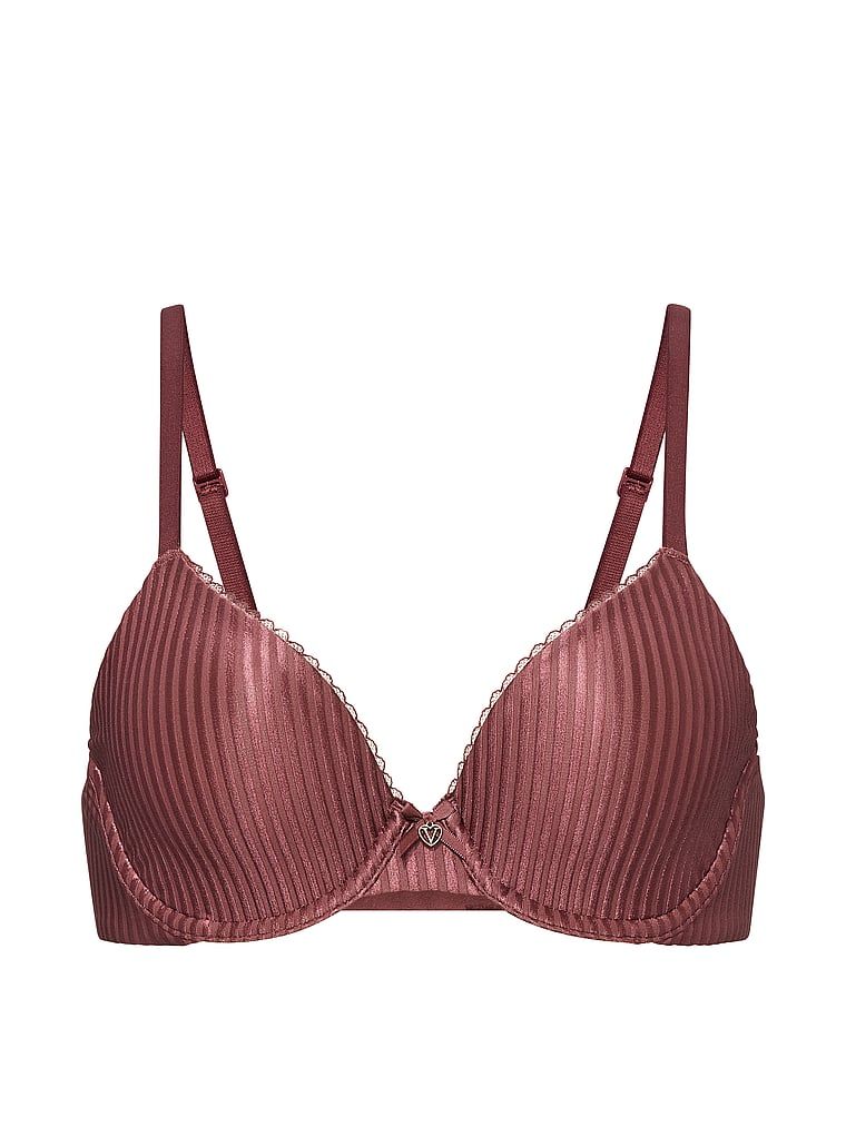 Neviditelná Lift Demi podprsenka. Produkt je růžové barvy a pochází z kolekce Body by Victoria.