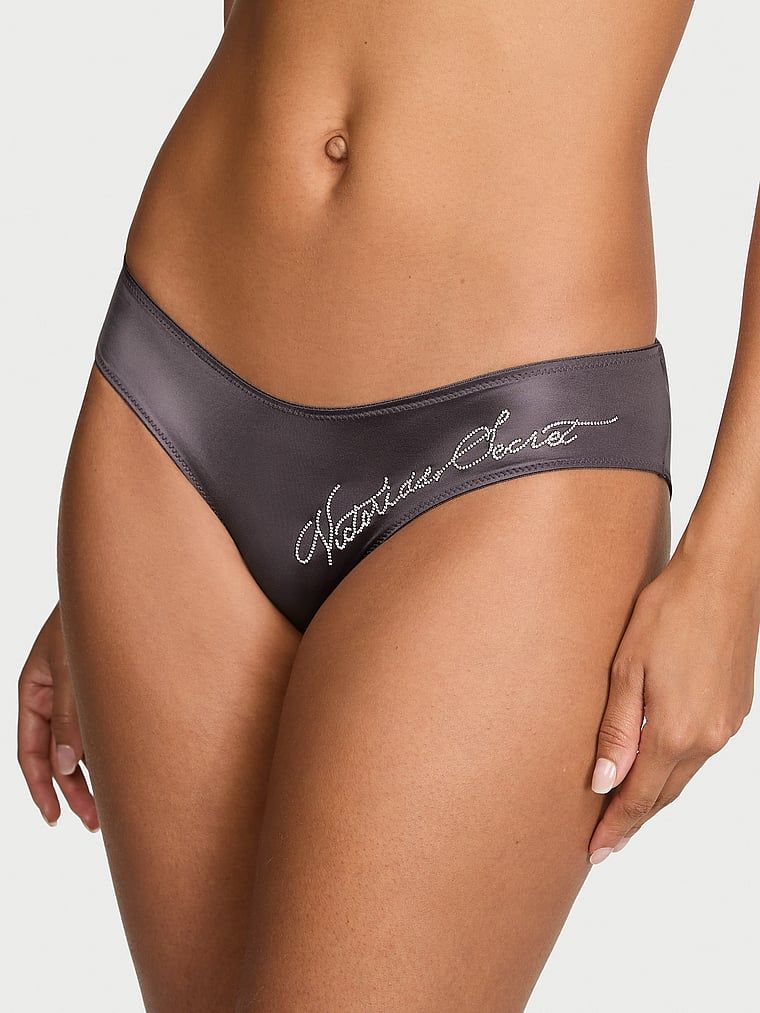 Kalhotky s unikátním zády a nápisem Shine Script Cheeky. Produkt je šedobarevný a pochází z kolekce Very Sexy.