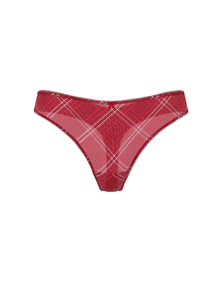 Lesklá tanga s třpytivou síťovinou. Produkt je vzorovaný a pochází z kolekce Lacie.